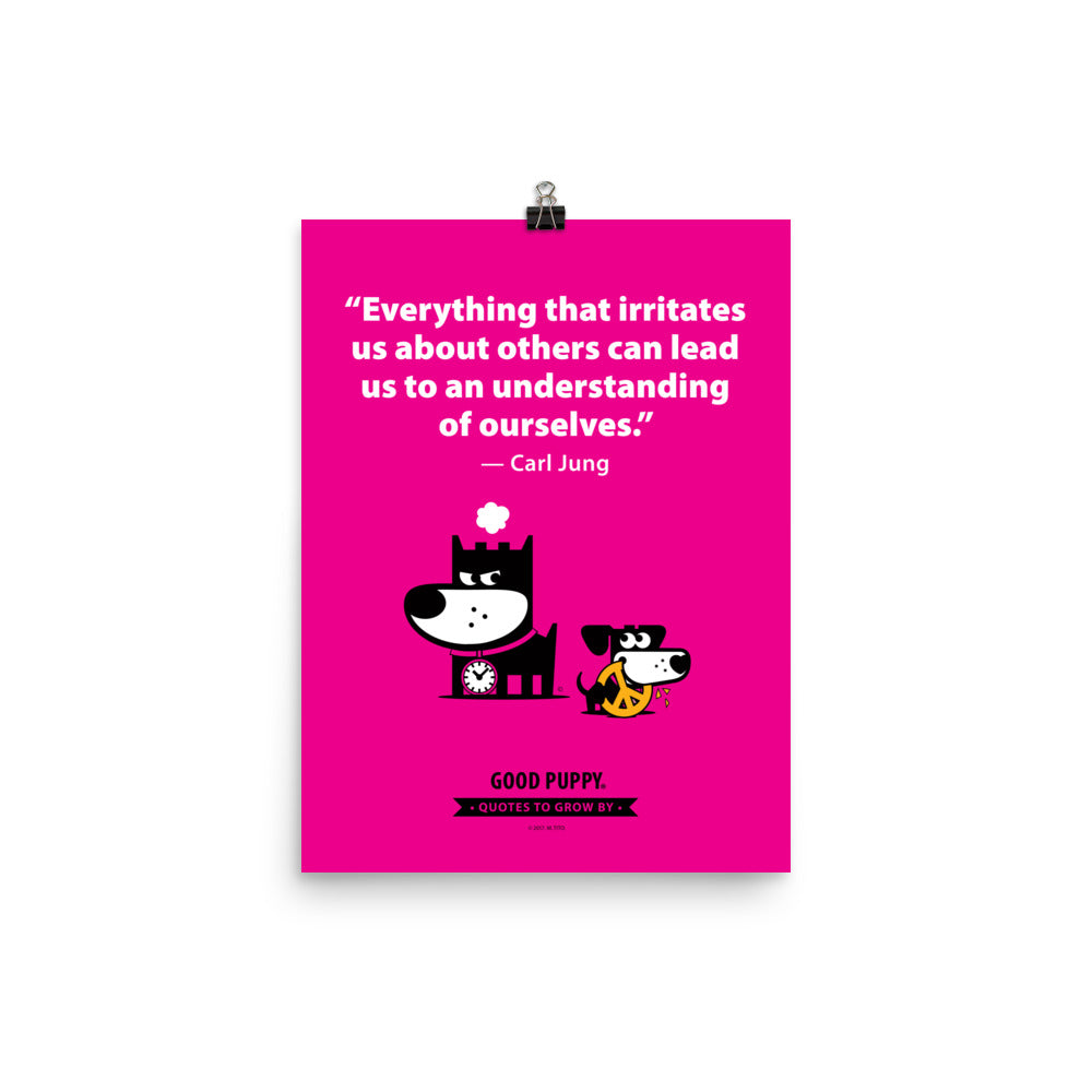 The image has a pink background with a quote from Carl Jung: "Everything that irritates us about others can lead us to an understanding of ourselves." Below the text, there is an illustration of a black and white dog with a clock collar, looking irritated, and a smaller black and white dog holding a peace symbol in its mouth. At the bottom, it reads "GOOD PUPPY. Quotes to Grow By."