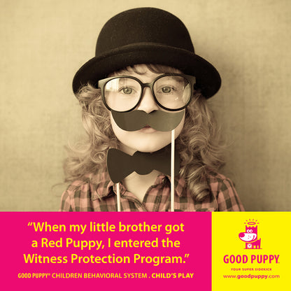 A young child is wearing a hat, glasses, and holding fake mustache and bowtie props. The caption reads: "When my little brother got a Red Puppy, I entered the Witness Protection Program." This is part of the Good Puppy Children Behavioral System labeled "Child’s Play," with the Good Puppy logo and website link at the bottom right.