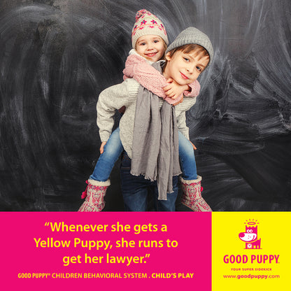 ChatGPT  The image shows two children in winter clothing, with one child giving the other a piggyback ride. They are standing in front of a dark chalkboard background. Below the image, a yellow and pink section features the text: "Whenever she gets a Yellow Puppy, she runs to get her lawyer." It also mentions "GOOD PUPPY® CHILDREN BEHAVIORAL SYSTEM. CHILD'S PLAY" and provides the website "www.goodpuppy.com." The Good Puppy logo and character are displayed on the right side.