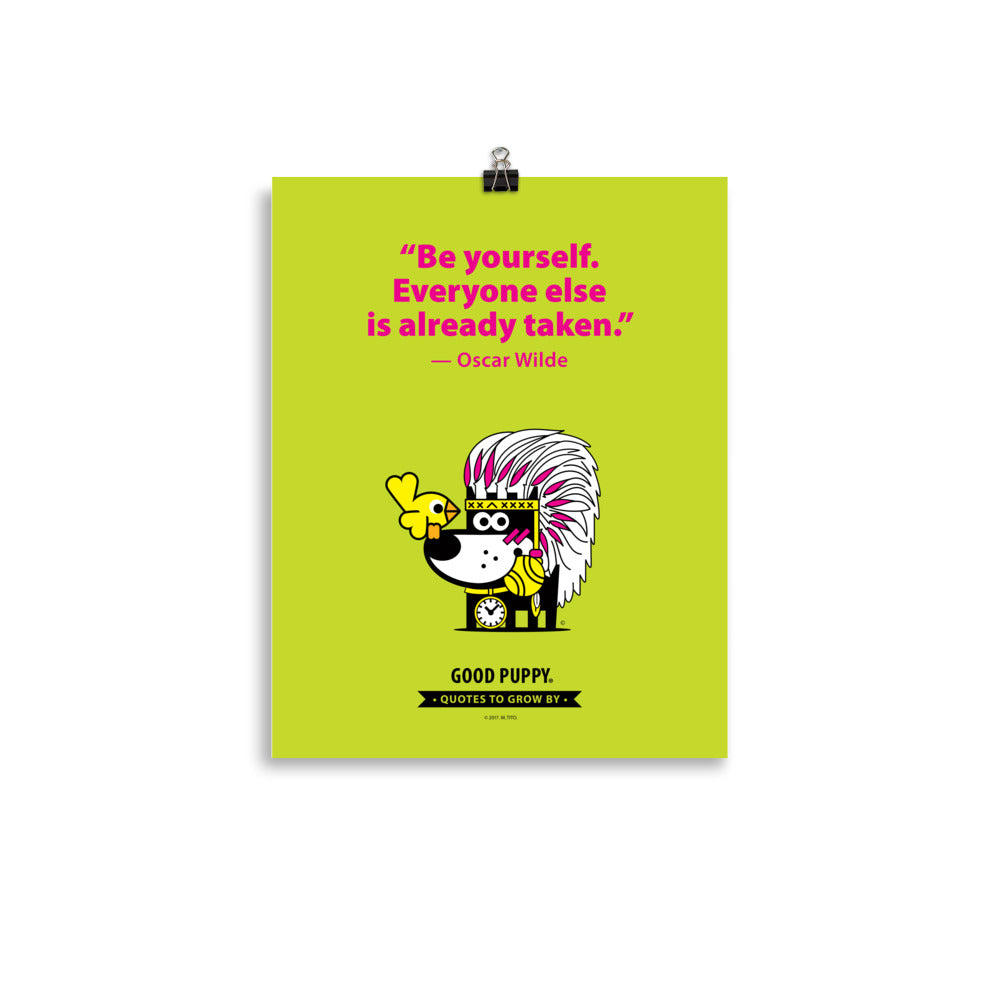 The image has a light green background with a quote by Oscar Wilde: "Be yourself. Everyone else is already taken." Below the quote is an illustration of a dog wearing a feathered headdress and holding a yellow bird. The text at the bottom reads, "GOOD PUPPY. QUOTES TO GROW BY." The image encourages individuality and self-acceptance in children.