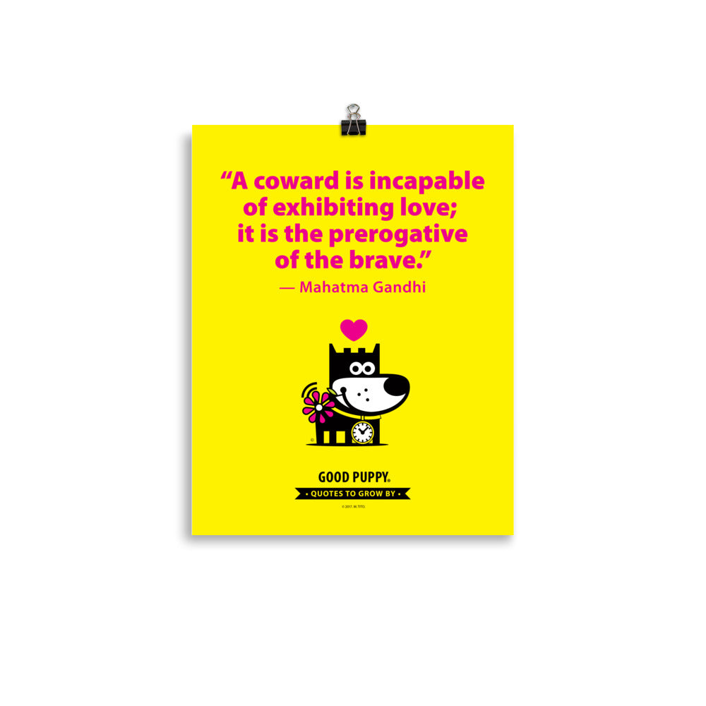 The image features a bright yellow background with a motivational quote by Mahatma Gandhi: "A coward is incapable of exhibiting love; it is the prerogative of the brave." Below the quote, there is an illustration of a smiling dog holding a flower, with a pink heart above its head. The text at the bottom reads, "GOOD PUPPY. QUOTES TO GROW BY." The image promotes positive behavior and emotional growth in children.