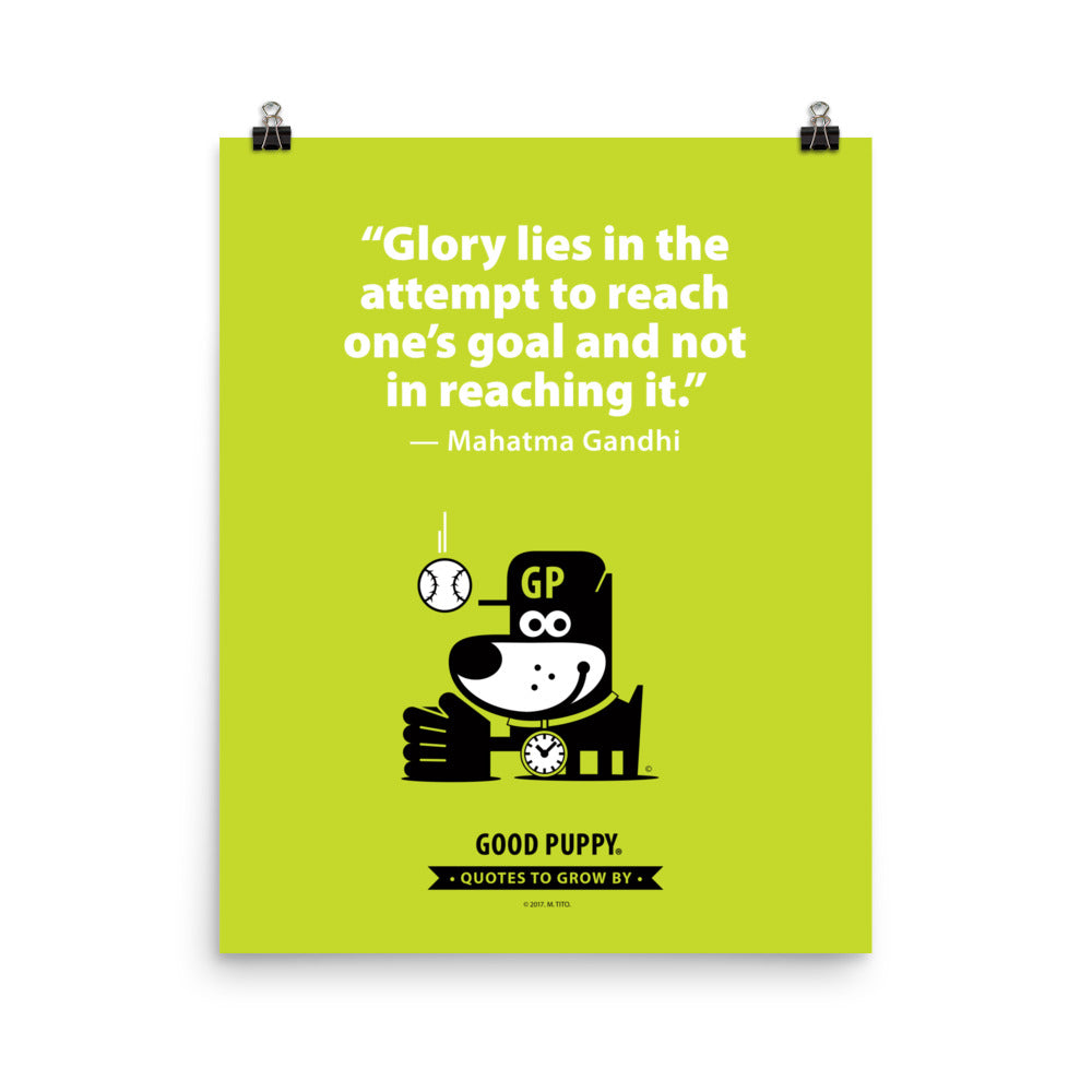 The image has a light green background with a quote from Mahatma Gandhi: "Glory lies in the attempt to reach one's goal and not in reaching it." Below the text, there is an illustration of a black and white dog wearing a cap with the letters "GP" and a clock collar, holding a baseball glove. At the bottom, it reads "GOOD PUPPY. Quotes to Grow By."