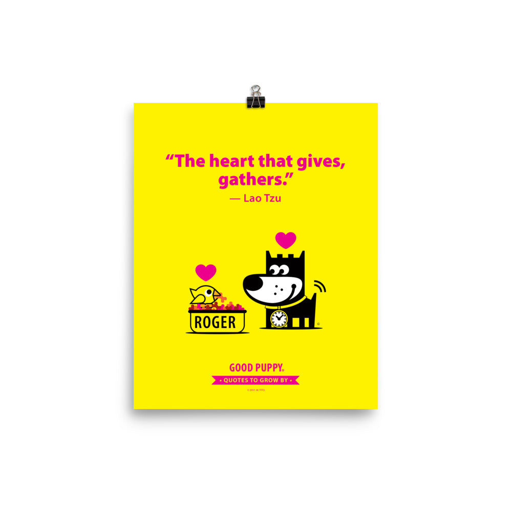 The image has a yellow background with pink text that reads, "The heart that gives, gathers." - Lao Tzu. Below the quote is an illustration of a black dog with a clock around its neck, facing a bowl labeled "ROGER" filled with food and a bird. Both the dog and the bird have pink hearts above them. At the bottom, it says "GOOD PUPPY" with a banner stating "Quotes to Grow By."