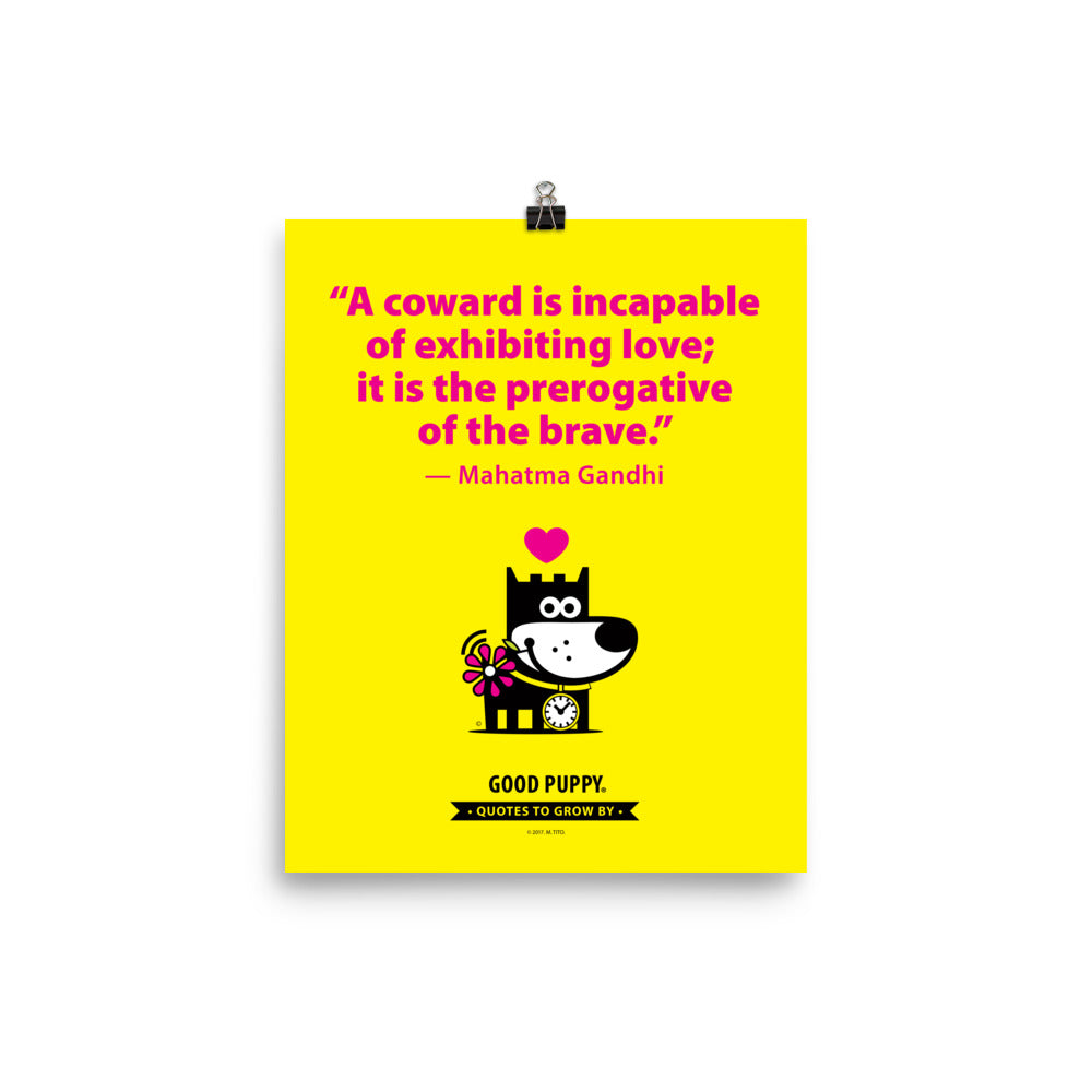 The image features a bright yellow background with a motivational quote by Mahatma Gandhi: "A coward is incapable of exhibiting love; it is the prerogative of the brave." Below the quote, there is an illustration of a smiling dog holding a flower, with a pink heart above its head. The text at the bottom reads, "GOOD PUPPY. QUOTES TO GROW BY." The image promotes positive behavior and emotional growth in children.