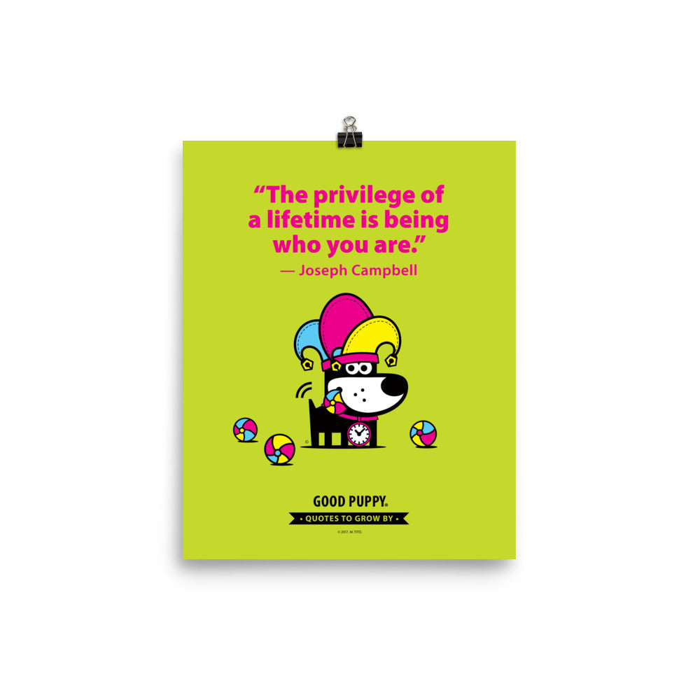 The image features a light green background with pink text that reads, "The privilege of a lifetime is being who you are." - Joseph Campbell. Below the quote, there is an illustration of a black dog with a clock around its neck, wearing a colorful jester hat, and surrounded by colorful balls. At the bottom, it says "GOOD PUPPY" with a banner stating "Quotes to Grow By."